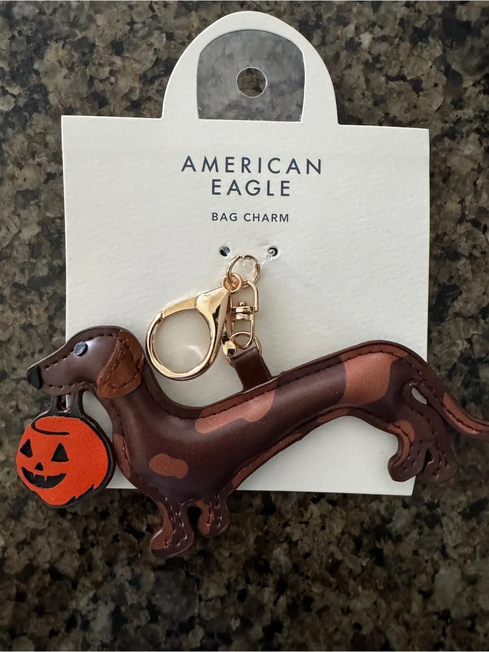 American Eagle Outfitters Brown Dachshund Bag Charm with Orange Pumpkin Accent